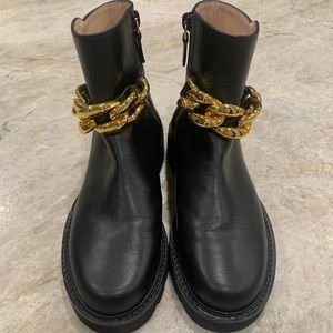 Stuart weiztman chain lift black leather bootie